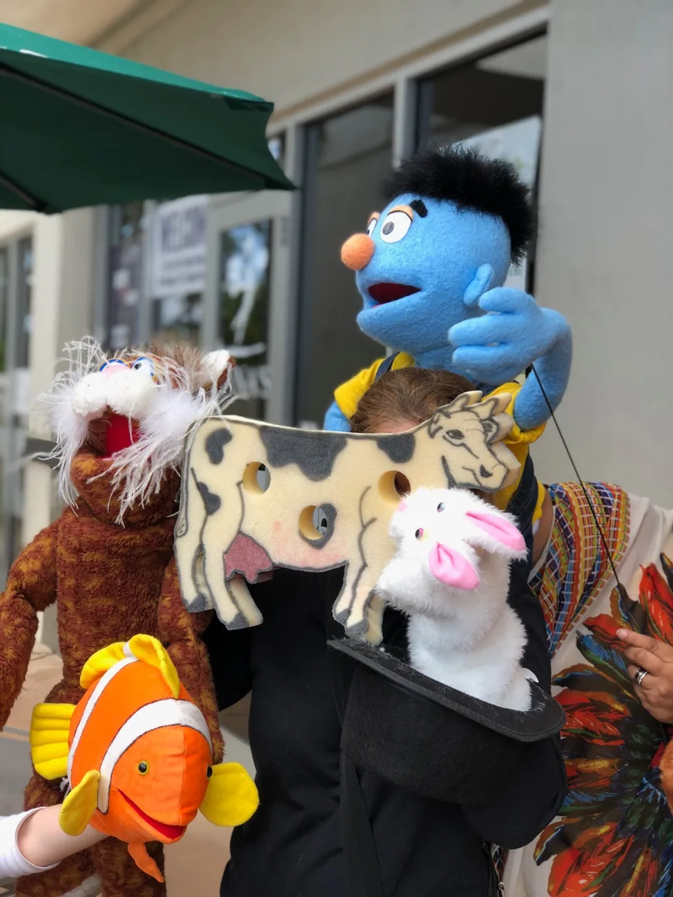 Kablooey and animal puppets at a Gary Kazoo event